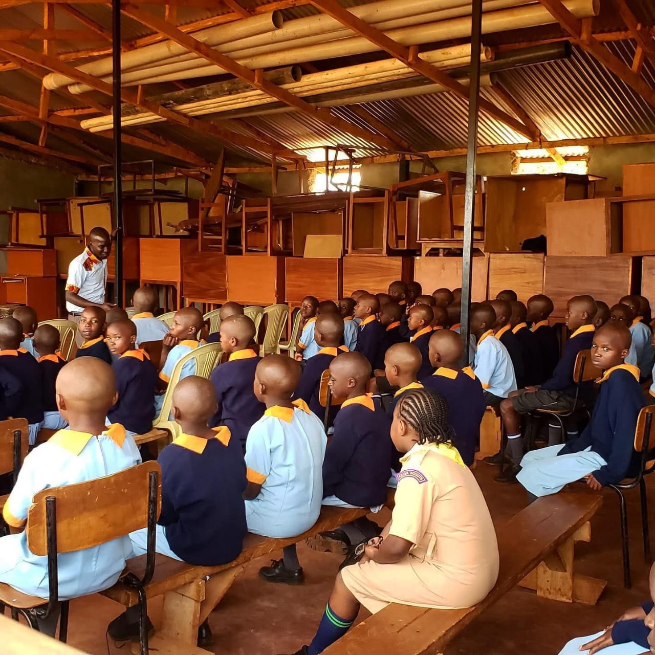 Students learning in a temporary classroom
